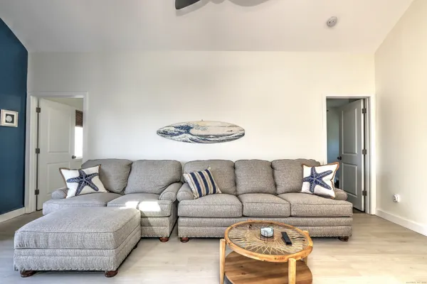 a living room with furniture and a couch
