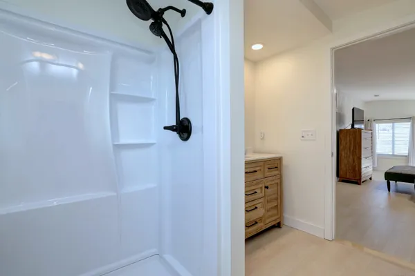 a view of a hallway with closet