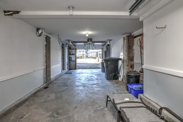 a kitchen with refrigerator and window