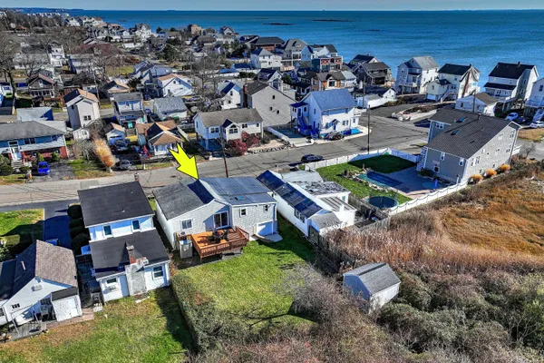 an aerial view of a house with a garden