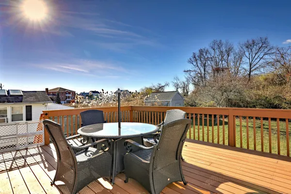 a view of a chairs and table on the deck