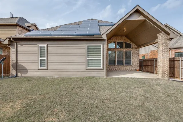 a front view of a house with a garage