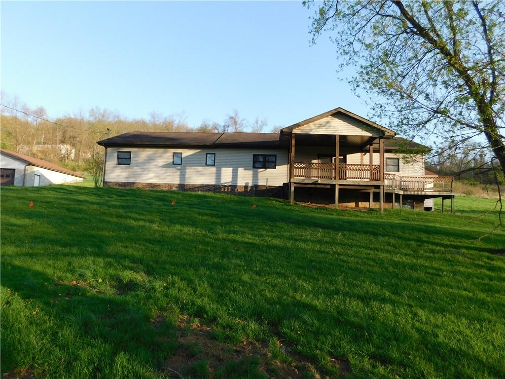 425 Vaneal Road Washington, PA 15301 - Photo 1 of 24 a front view of a house with a yard