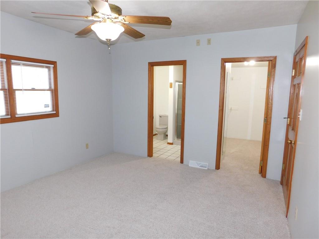 425 Vaneal Road Washington, PA 15301 - Photo 12 of 24 an empty room with windows and fan