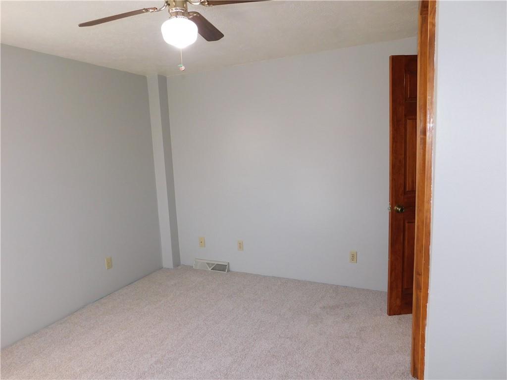 425 Vaneal Road Washington, PA 15301 - Photo 16 of 24 an empty room with a chandelier fan