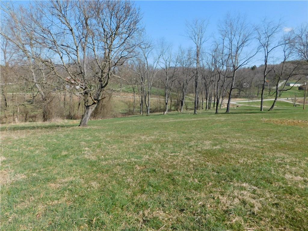 425 Vaneal Road Washington, PA 15301 - Photo 22 of 24 a view of a grassy field with trees