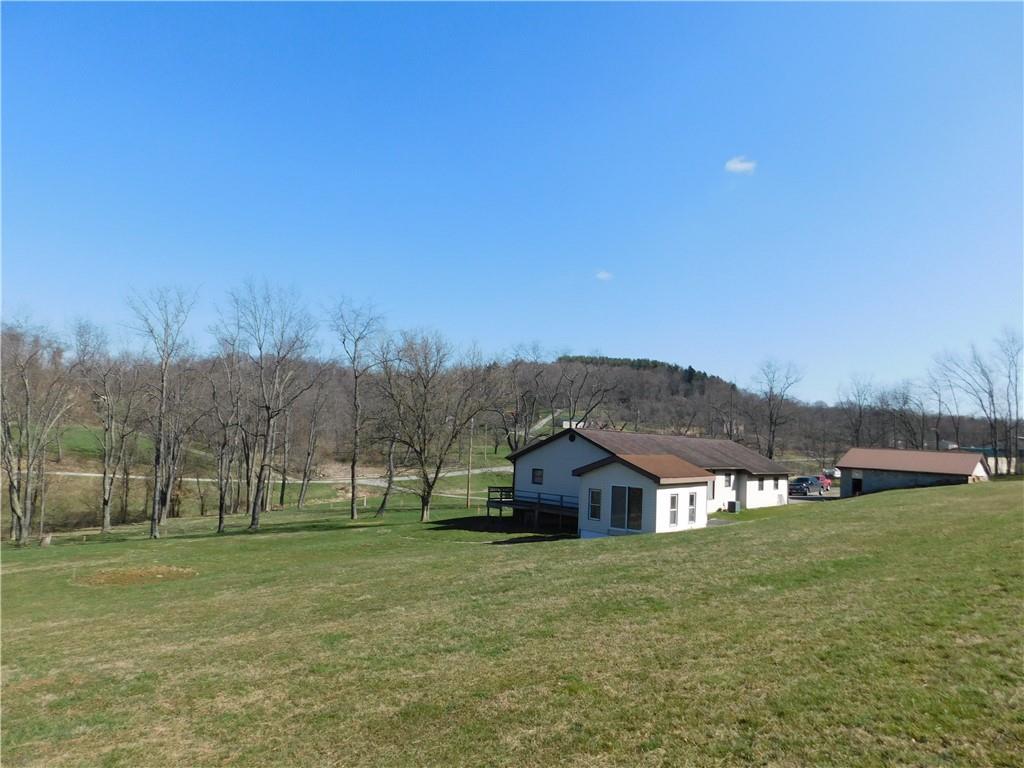 425 Vaneal Road Washington, PA 15301 - Photo 4 of 24 a view of a house with a big yard