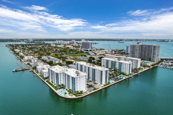 a view of a city with lawn chairs
