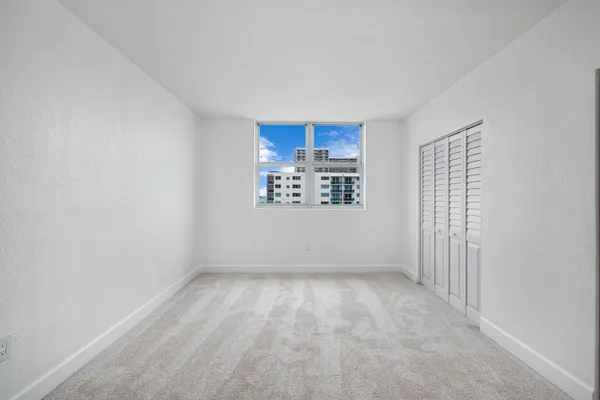 a view of livingroom with hardwood floor and a window