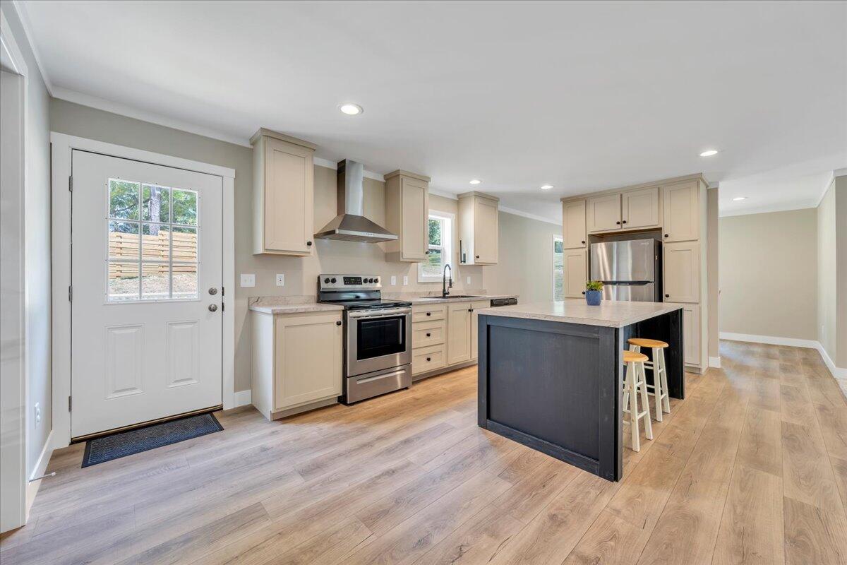 165 Spence Road Union Hall, VA 24176 - Photo 16 of 58 a large kitchen with a center island and stainless steel appliances