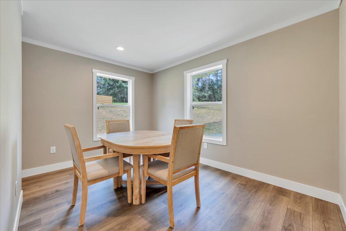 165 Spence Road Union Hall, VA 24176 - Photo 20 of 58 a view of a dining room with furniture window and wooden floor