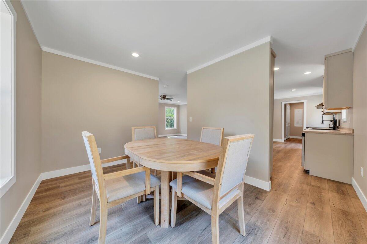 165 Spence Road Union Hall, VA 24176 - Photo 22 of 58 a view of a dining room with furniture and wooden floor