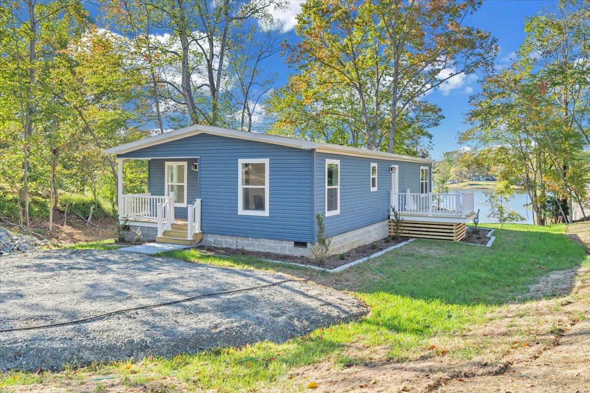 165 Spence Road Union Hall, VA 24176 - Photo 47 of 58 a view of a house with a yard
