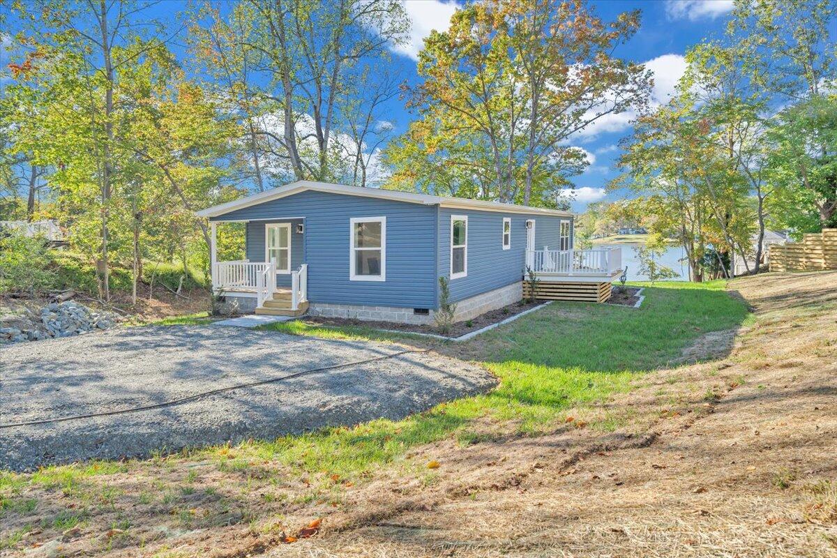 165 Spence Road Union Hall, VA 24176 - Photo 48 of 58 a front view of a house with garden