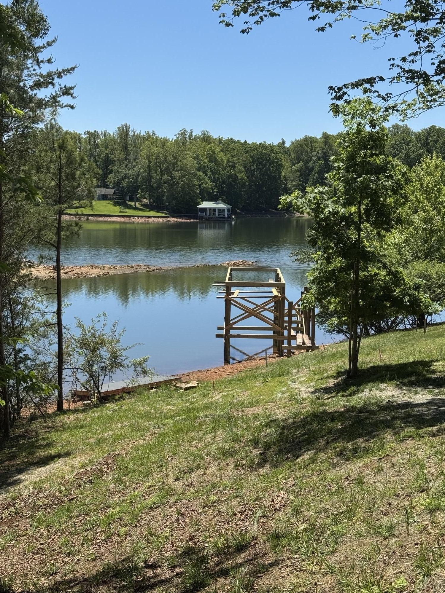 165 Spence Road Union Hall, VA 24176 - Photo 7 of 58 a view of a lake with a yard