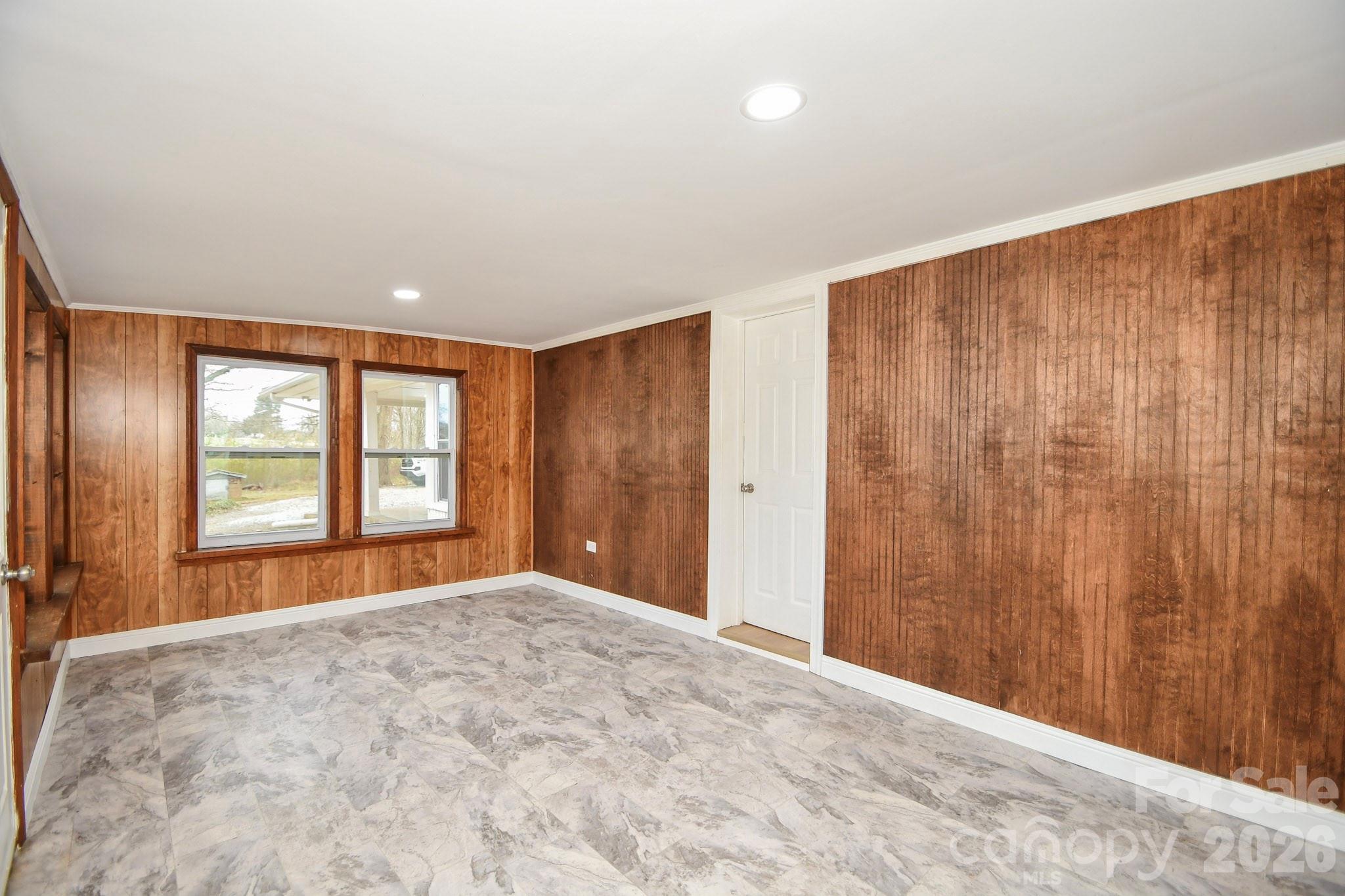 4517 Plyler Mill Road Monroe, NC 28112 - Photo 31 of 37 a view of an empty room with a window