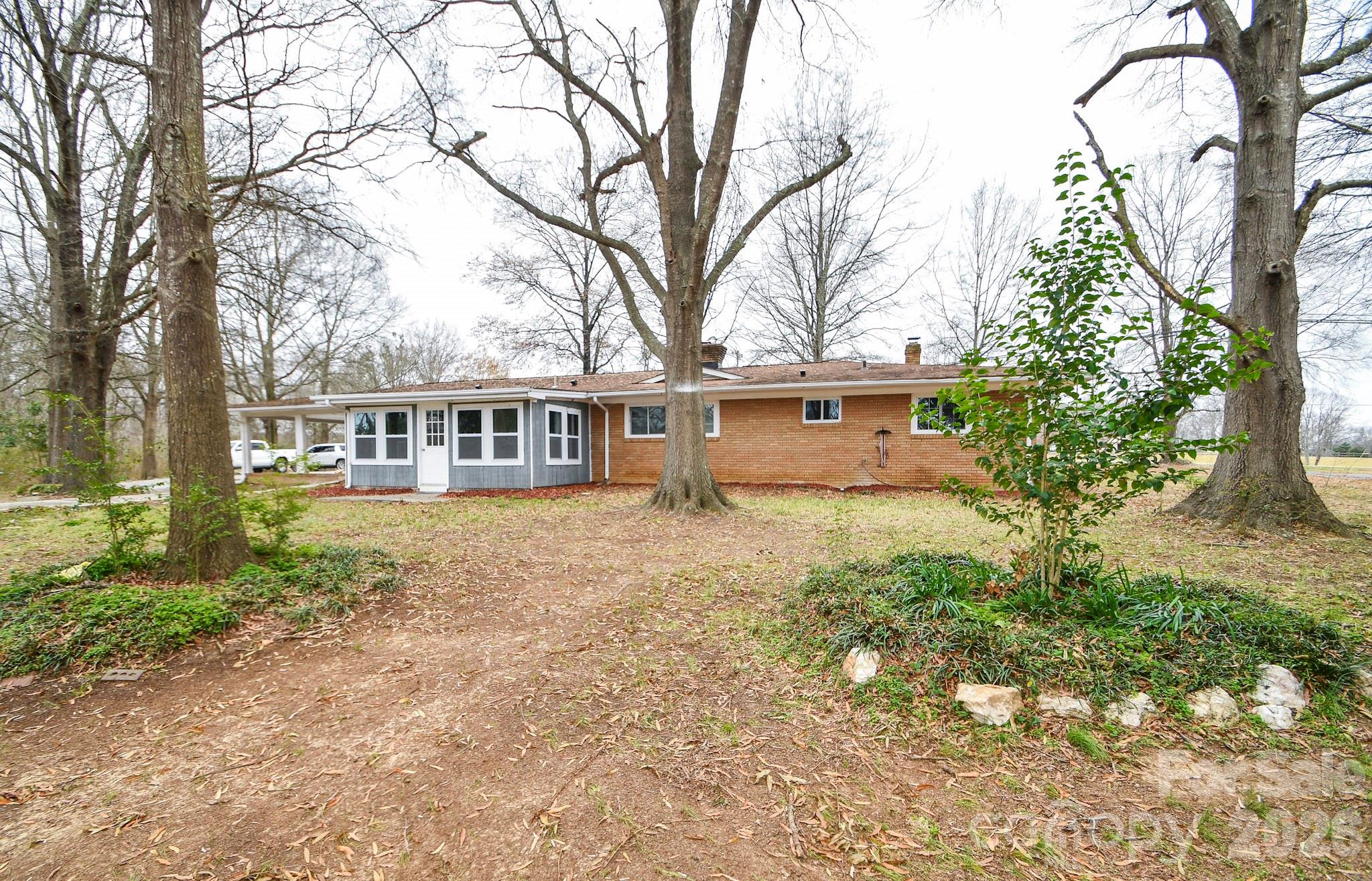 4517 Plyler Mill Road Monroe, NC 28112 - Photo 34 of 37 a house view with a outdoor space