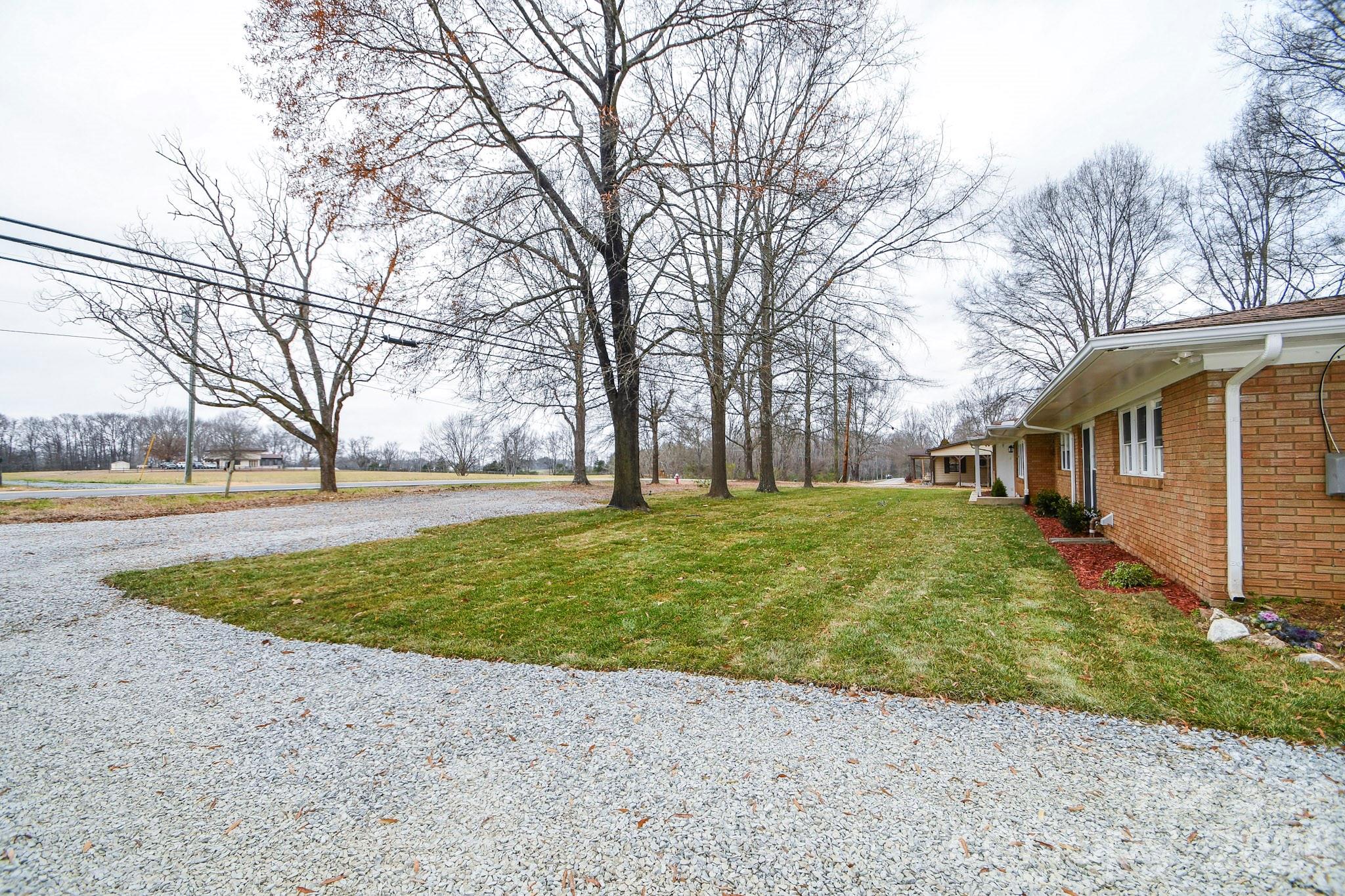 4517 Plyler Mill Road Monroe, NC 28112 - Photo 37 of 37 a view of yard with trees