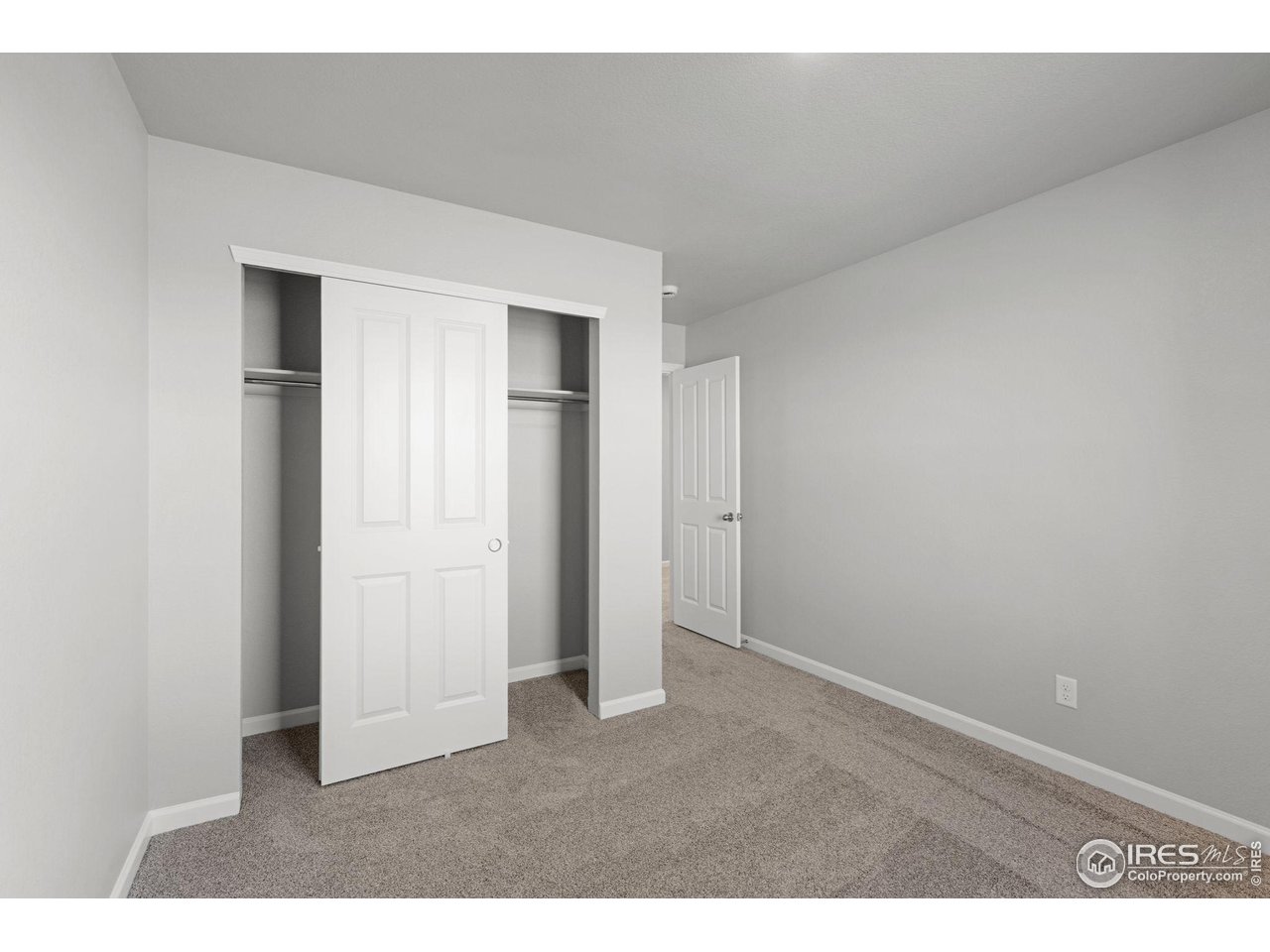 6765 Utica Court Firestone, CO 80504 - Photo 19 of 23 a view of an empty room