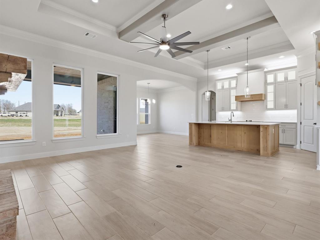 3152 Infinity Drive Weatherford, TX 76087 - Photo 20 of 40 a view of kitchen with cabinets and window