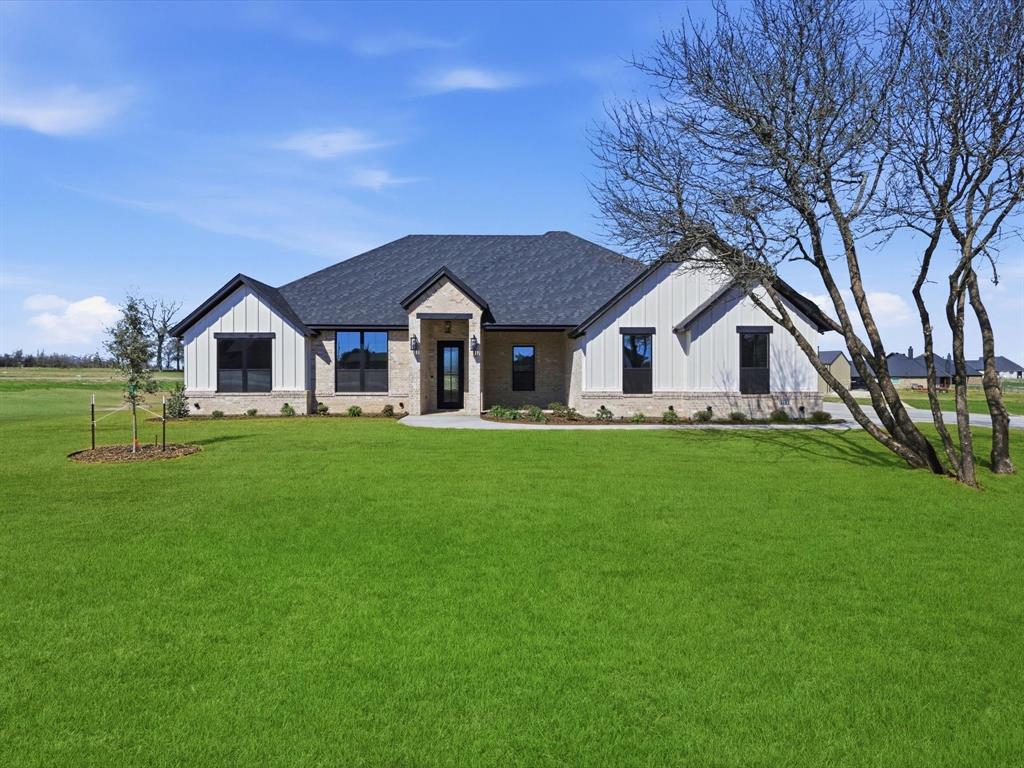 3152 Infinity Drive Weatherford, TX 76087 - Photo 2 of 40 a view of house with yard and green space