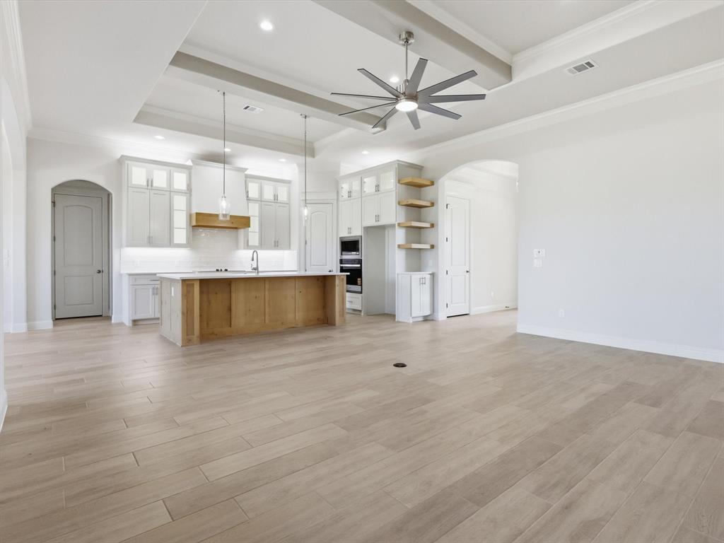 3152 Infinity Drive Weatherford, TX 76087 - Photo 21 of 40 a view of a kitchen with a sink and a refrigerator