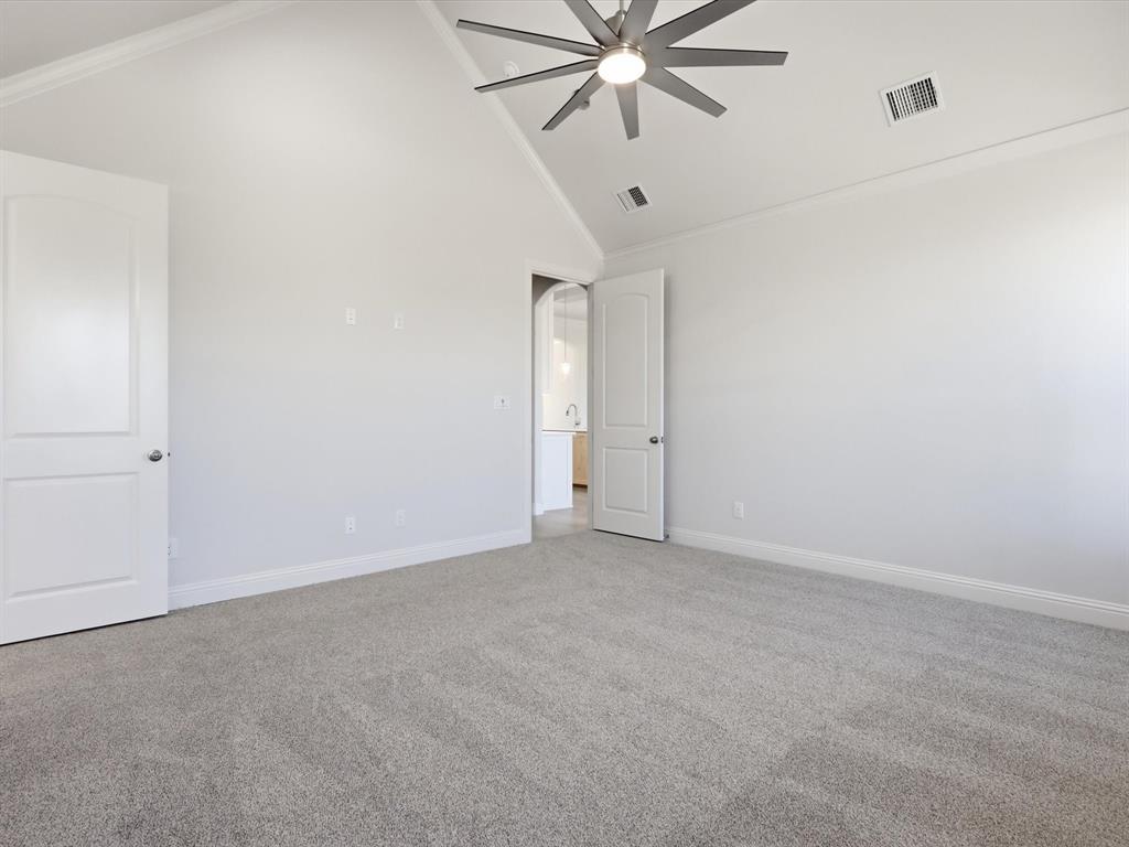 3152 Infinity Drive Weatherford, TX 76087 - Photo 25 of 40 an empty room with a fan and a fan