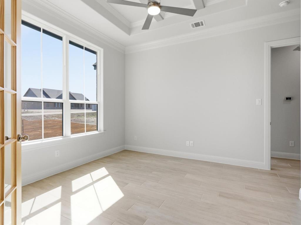 3152 Infinity Drive Weatherford, TX 76087 - Photo 31 of 40 an empty room with a window