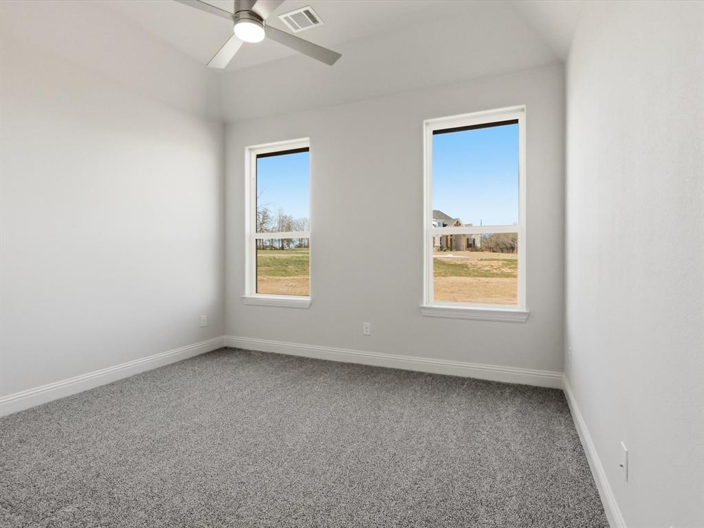 3152 Infinity Drive Weatherford, TX 76087 - Photo 34 of 40 an empty room with a window