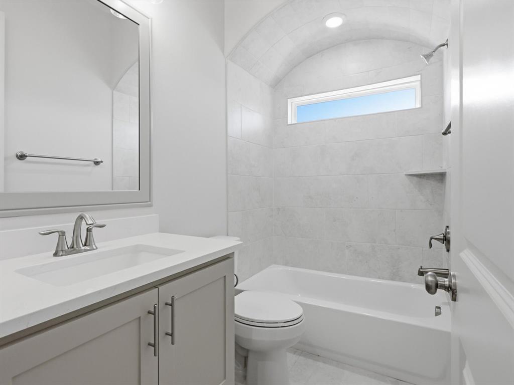 3152 Infinity Drive Weatherford, TX 76087 - Photo 35 of 40 a bathroom with a sink a toilet and shower