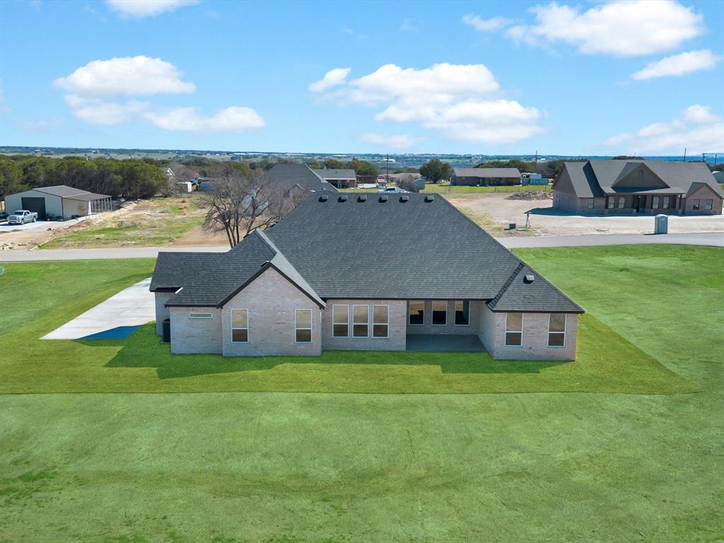 3152 Infinity Drive Weatherford, TX 76087 - Photo 39 of 40 an aerial view of a house with yard and ocean view