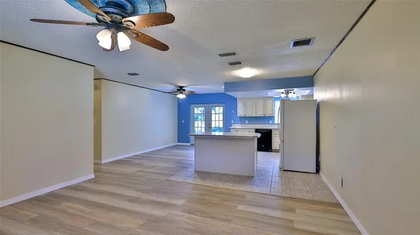 a view of kitchen and windows