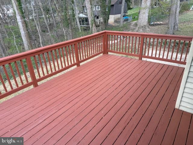 3604 4th Street North Beach, MD 20714 - Photo 11 of 14 a view of balcony with wooden floor