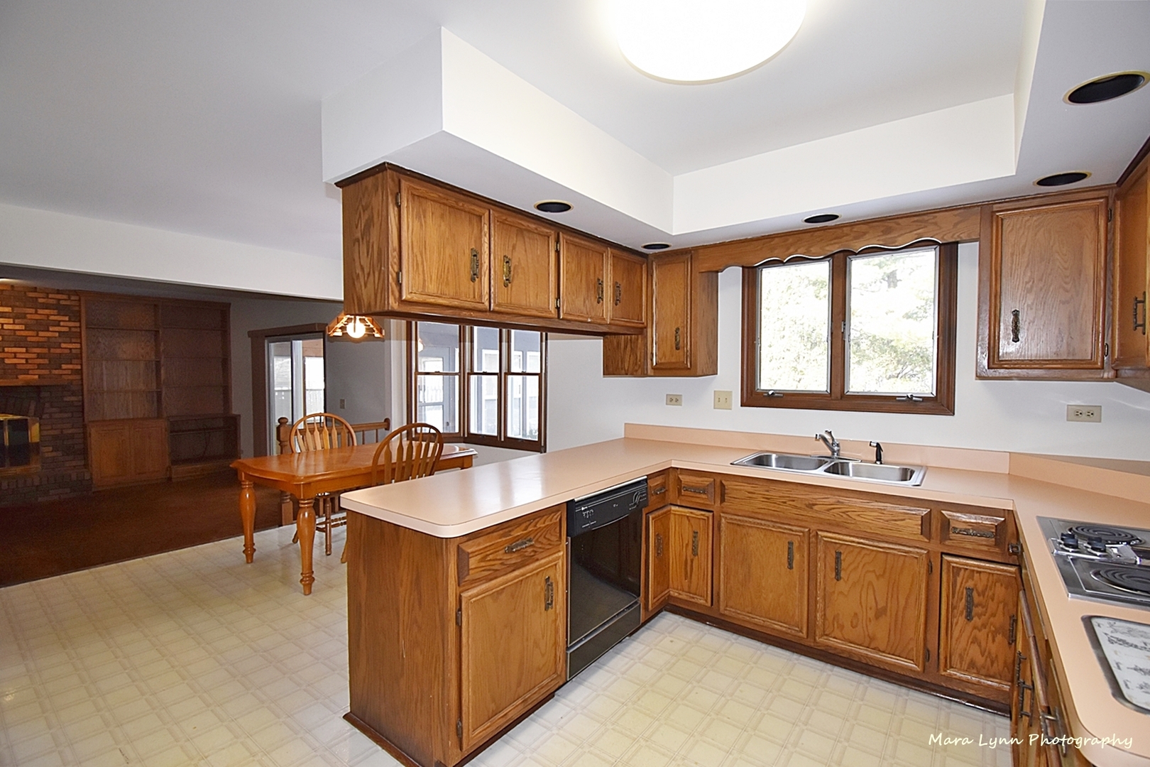 36W818 Oak Road St. Charles, IL 60175 - Photo 11 of 46 a kitchen with a sink stove and cabinets