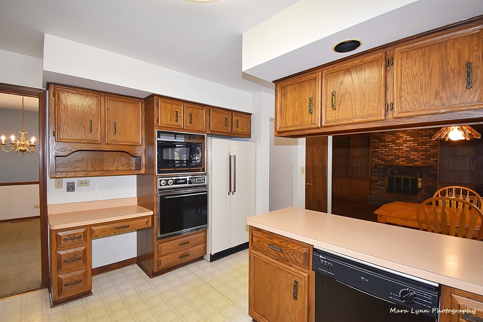 36W818 Oak Road St. Charles, IL 60175 - Photo 12 of 46 a kitchen with stainless steel appliances a refrigerator and a stove top oven