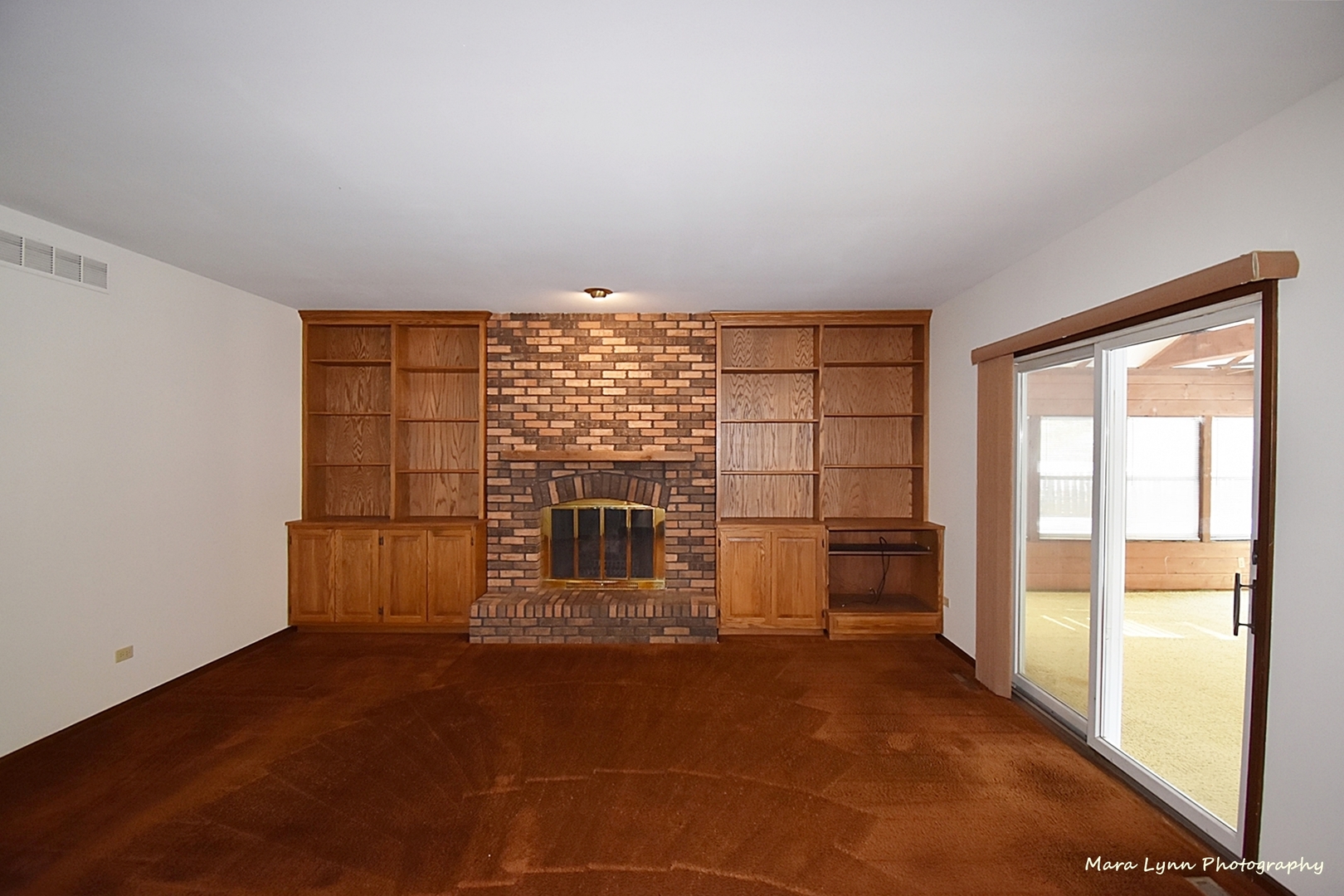 36W818 Oak Road St. Charles, IL 60175 - Photo 13 of 46 a living room with a large window