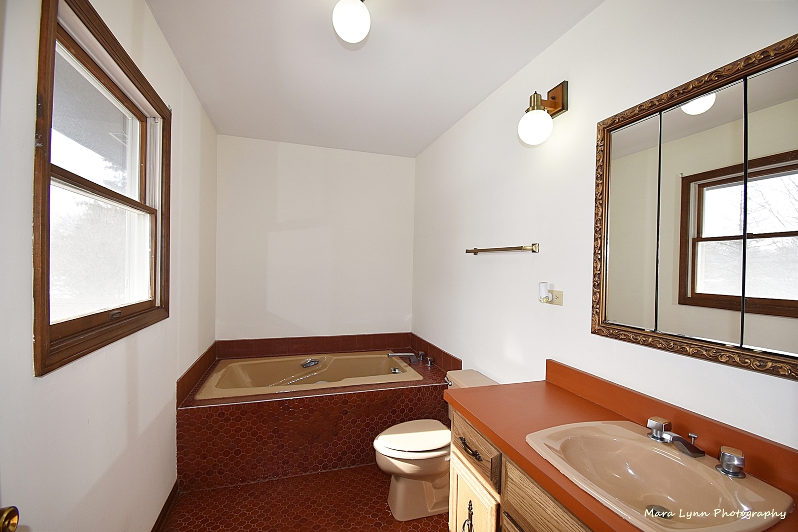 36W818 Oak Road St. Charles, IL 60175 - Photo 23 of 46 a bathroom with a sink toilet and window