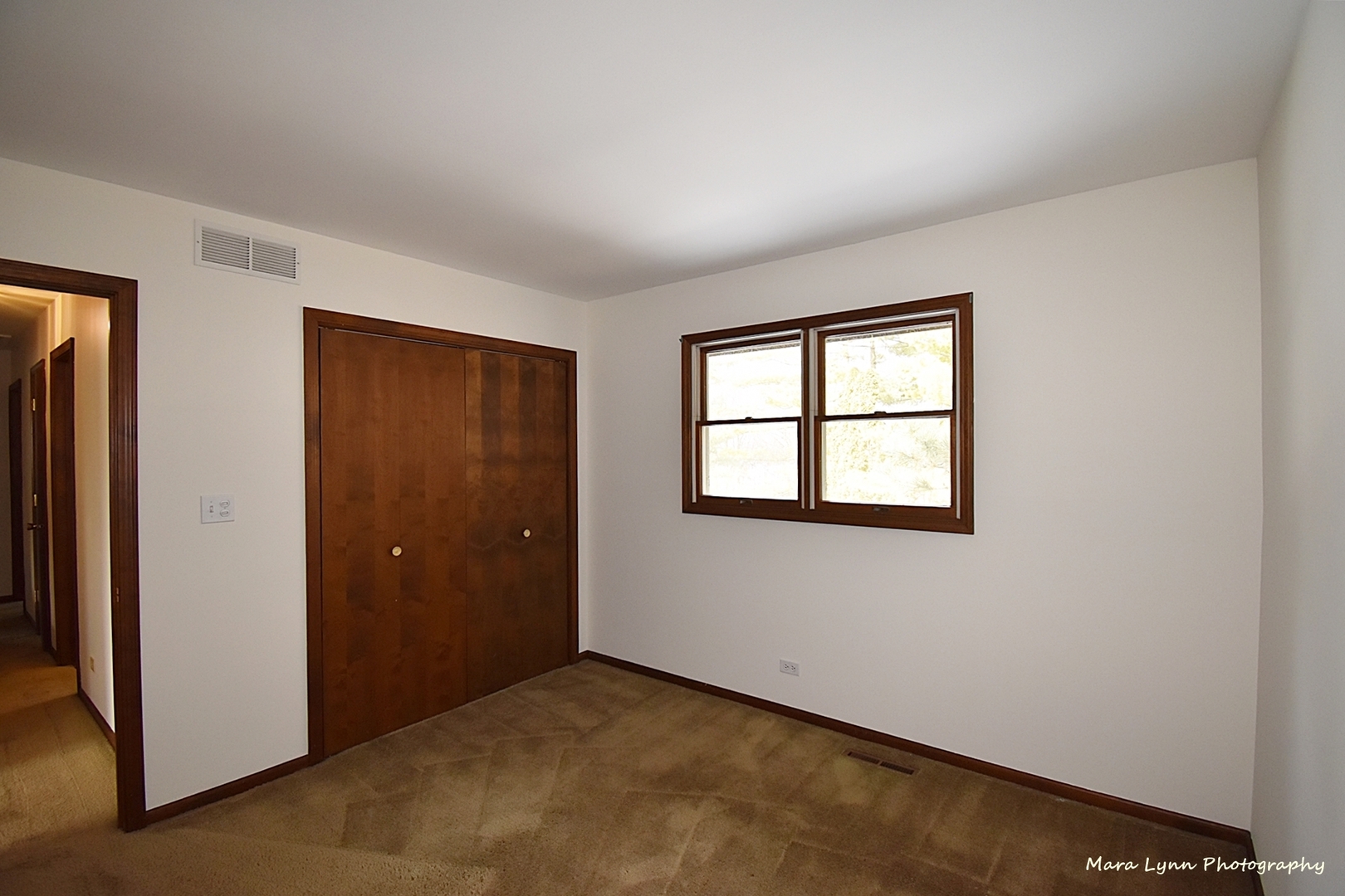 36W818 Oak Road St. Charles, IL 60175 - Photo 25 of 46 an empty room with windows and closet