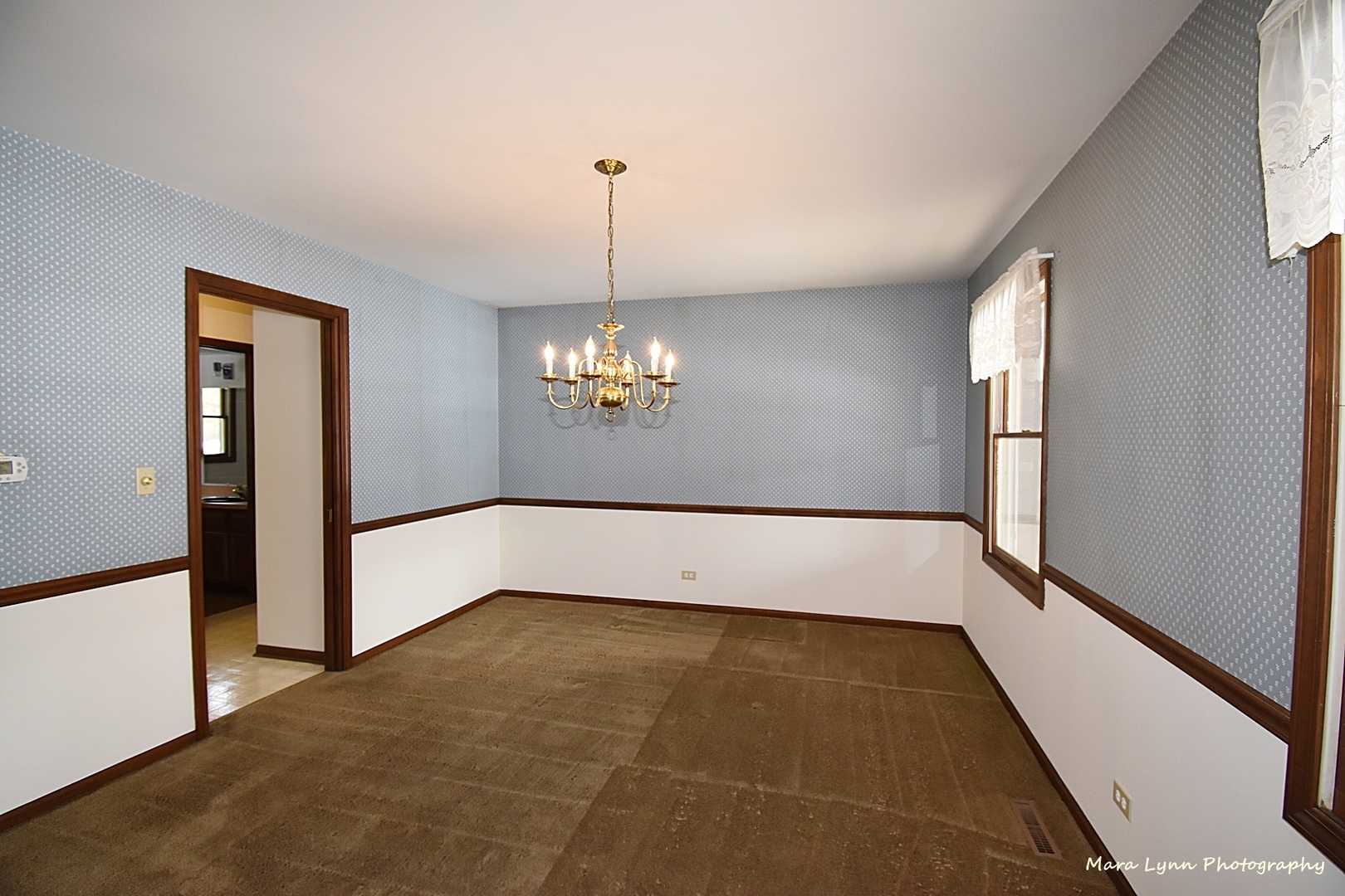 36W818 Oak Road St. Charles, IL 60175 - Photo 7 of 46 a view of an empty room with a window