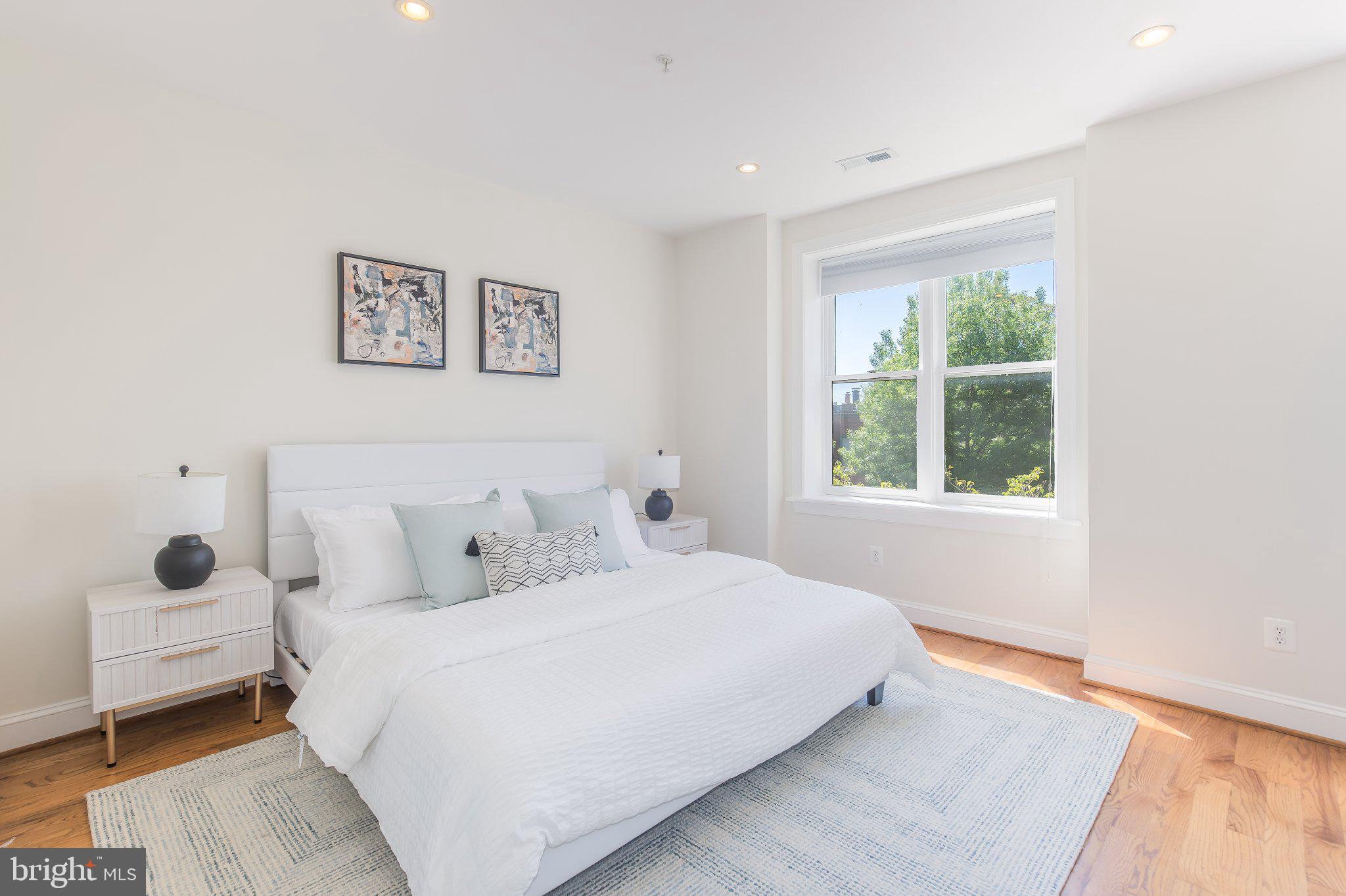 1116 C Street Northeast, Unit 202 Washington, DC 20002 - Photo 15 of 30 Bright and airy modern bedroom retreat.