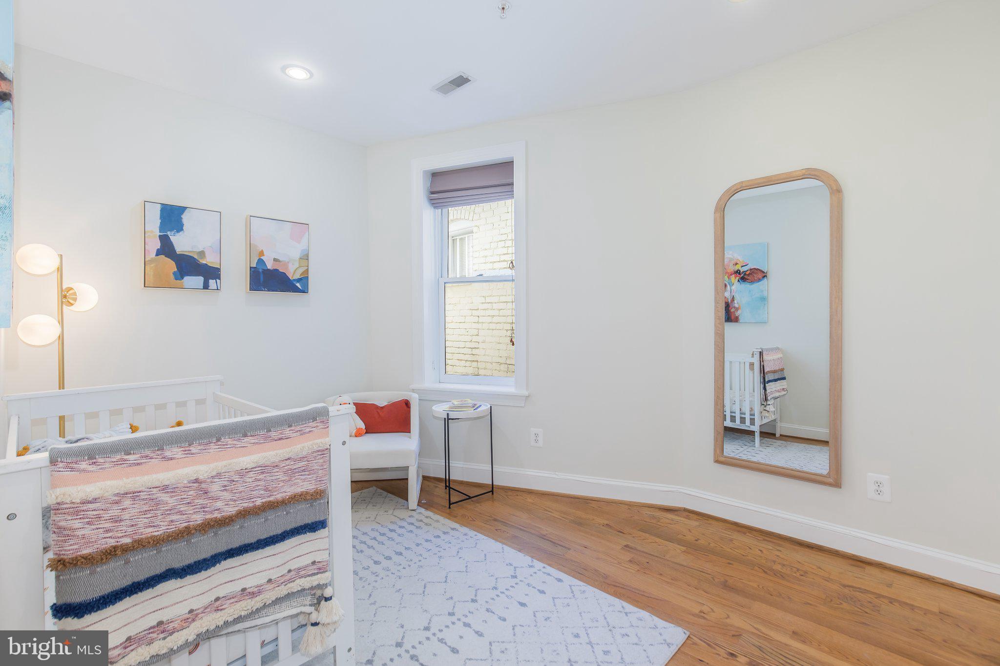 1116 C Street Northeast, Unit 202 Washington, DC 20002 - Photo 21 of 30 Bright and airy nursery retreat.