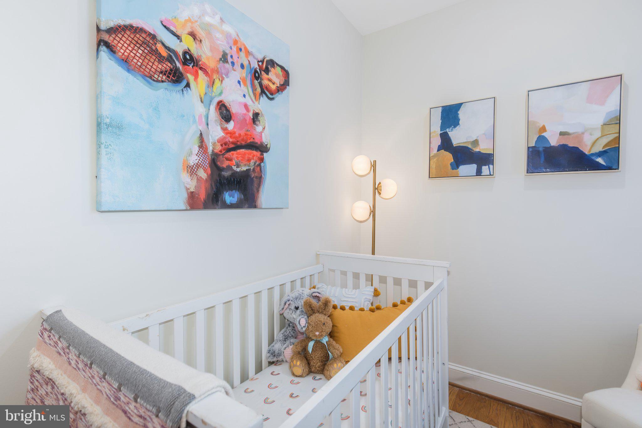 1116 C Street Northeast, Unit 202 Washington, DC 20002 - Photo 24 of 30 Whimsical nursery with vibrant art.