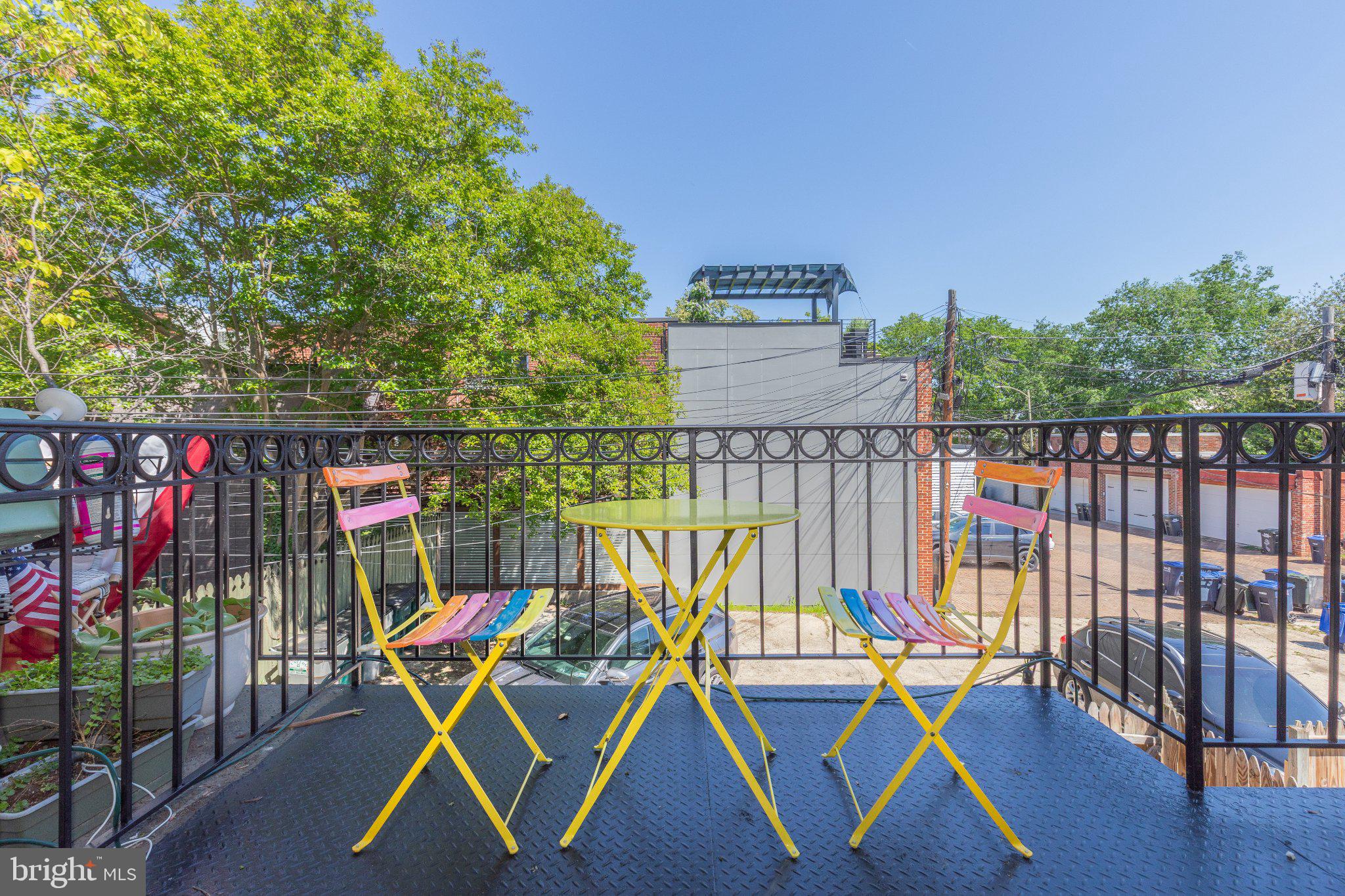 1116 C Street Northeast, Unit 202 Washington, DC 20002 - Photo 29 of 30 Charming balcony with vibrant seating.