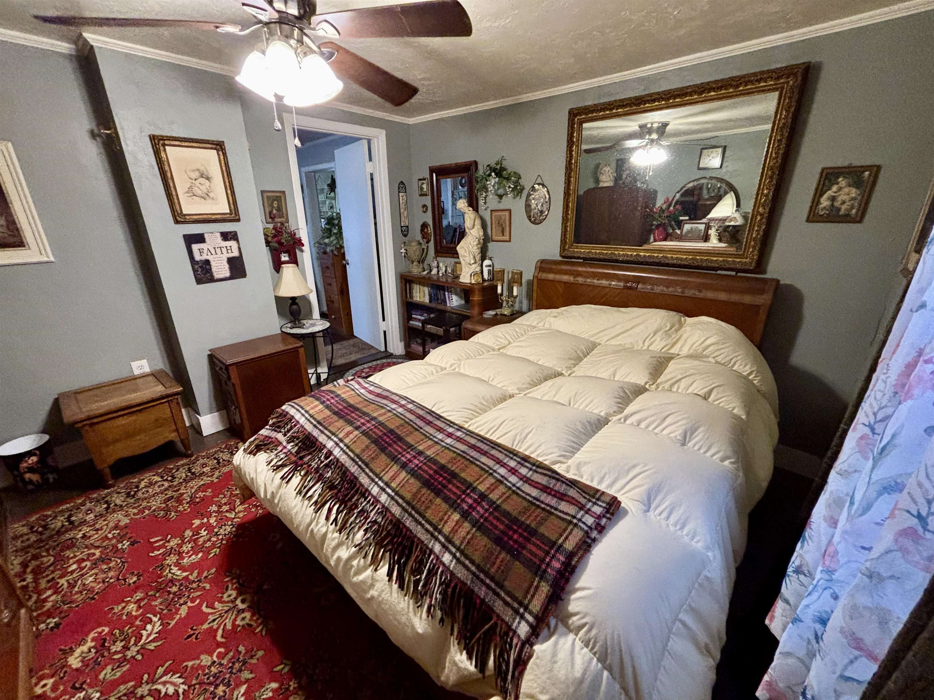 3485-3465 Pine Grove Road Stanley, VA 22851 - Photo 19 of 47 a bedroom with a bed and a chandelier