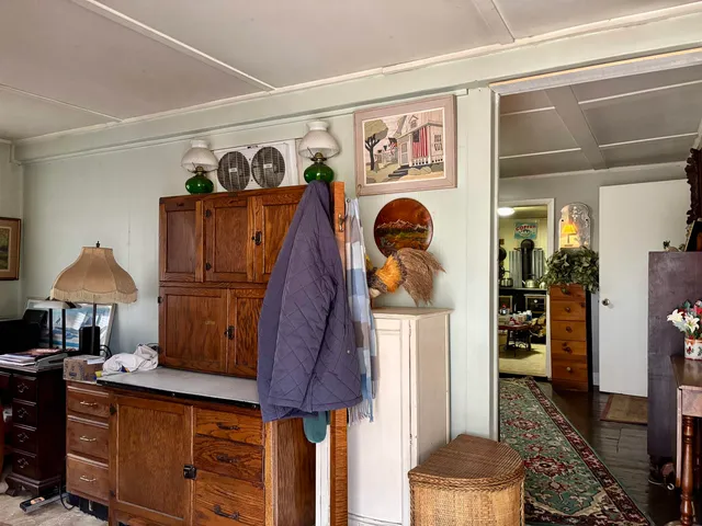 a view of a entryway with furniture and toys