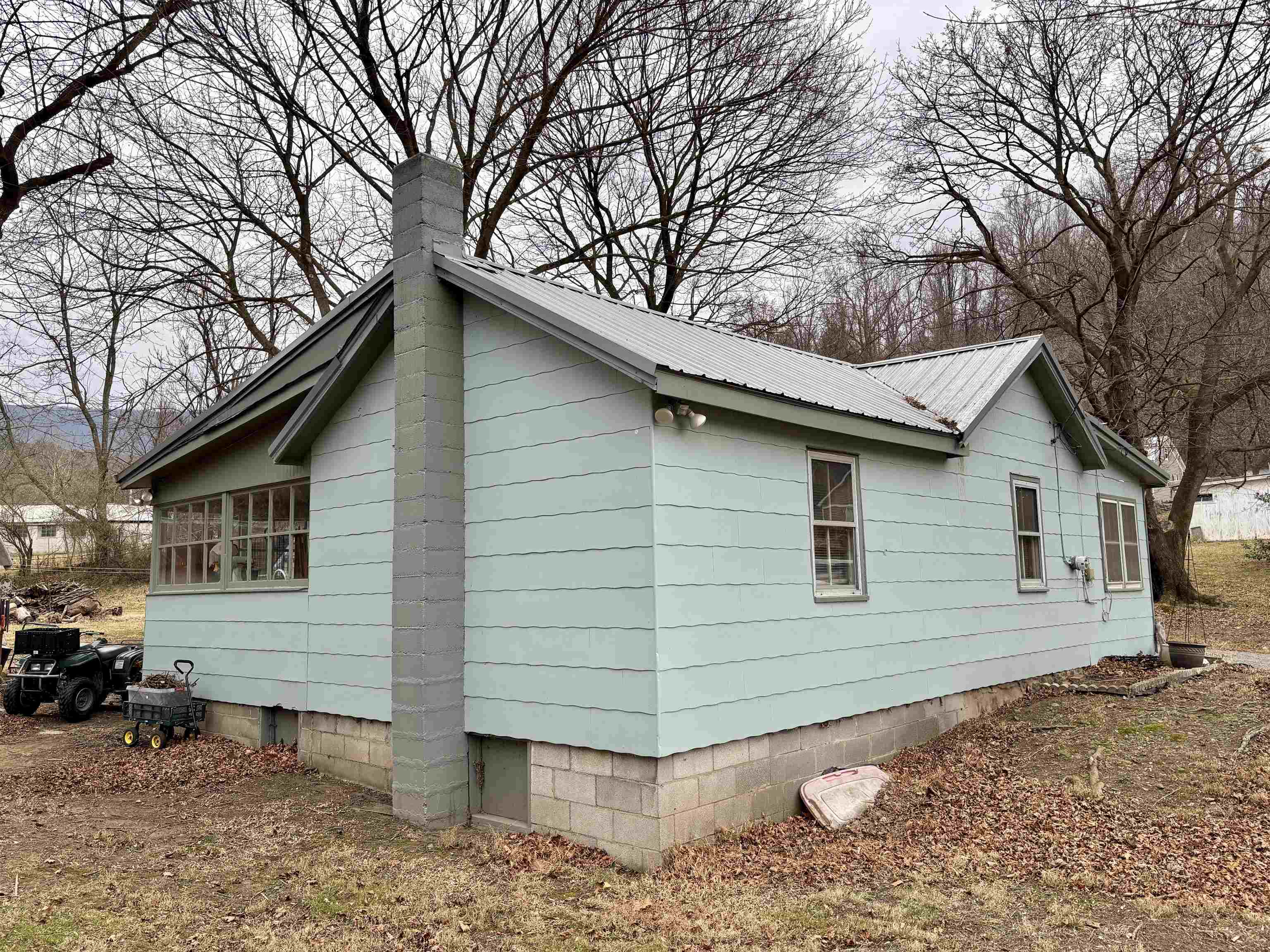 3485-3465 Pine Grove Road Stanley, VA 22851 - Photo 29 of 47 a view of a house with a yard