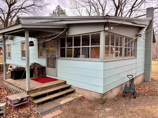a front view of a house with a balcony