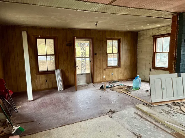 a view of a room with a large window