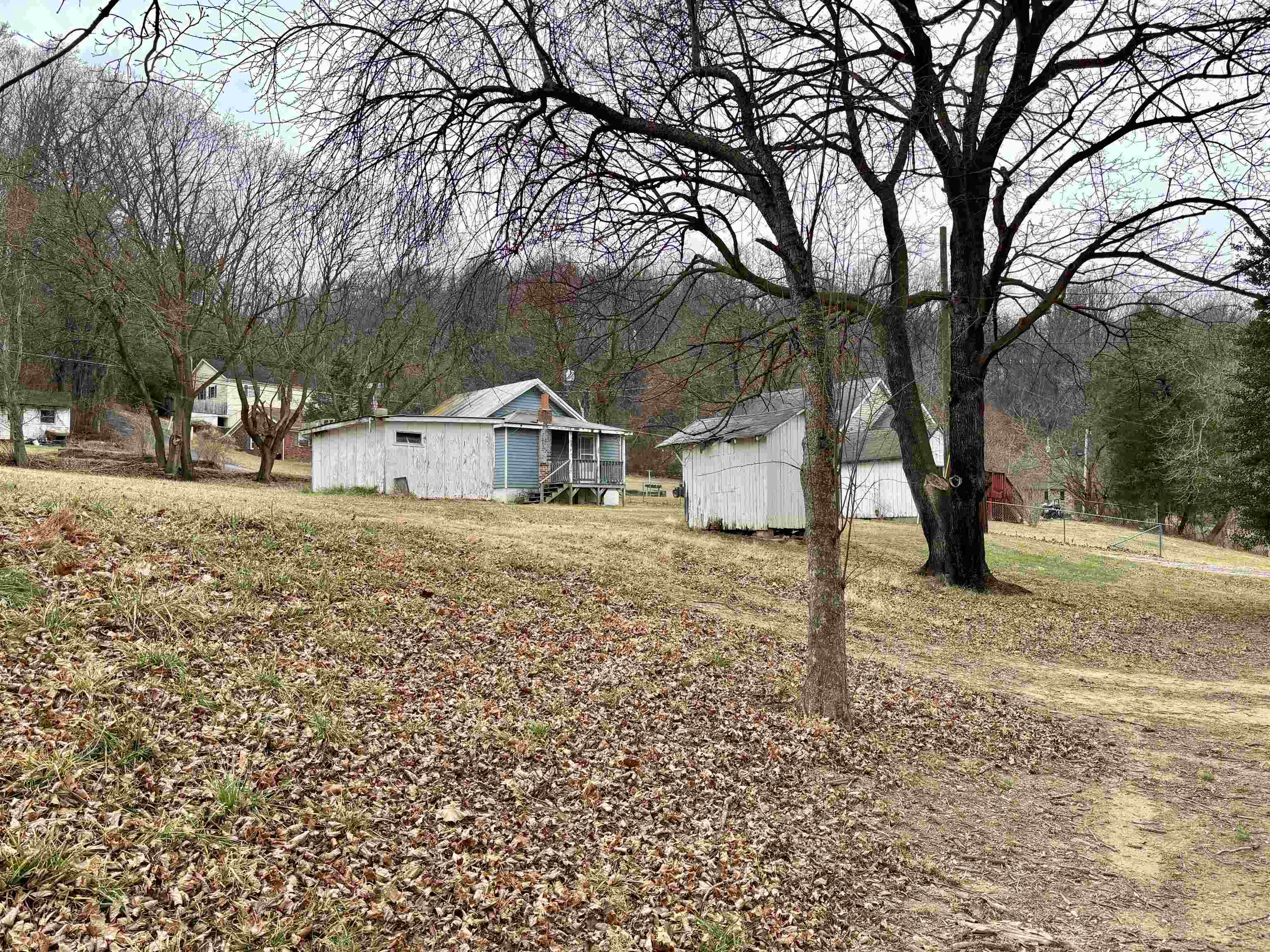 3485-3465 Pine Grove Road Stanley, VA 22851 - Photo 47 of 47 a house with trees in front of it