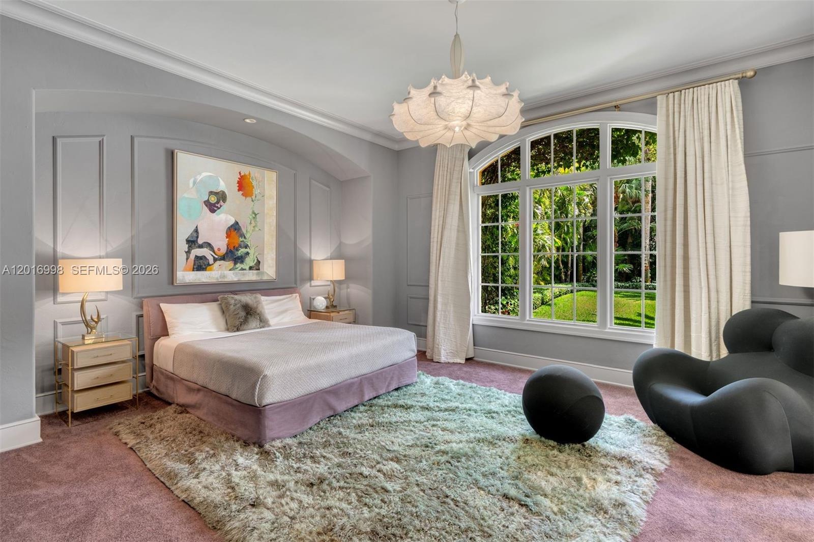 4790 Southwest 78th Street Miami, FL 33143 - Photo 8 of 33 a bedroom with a bed and a large window